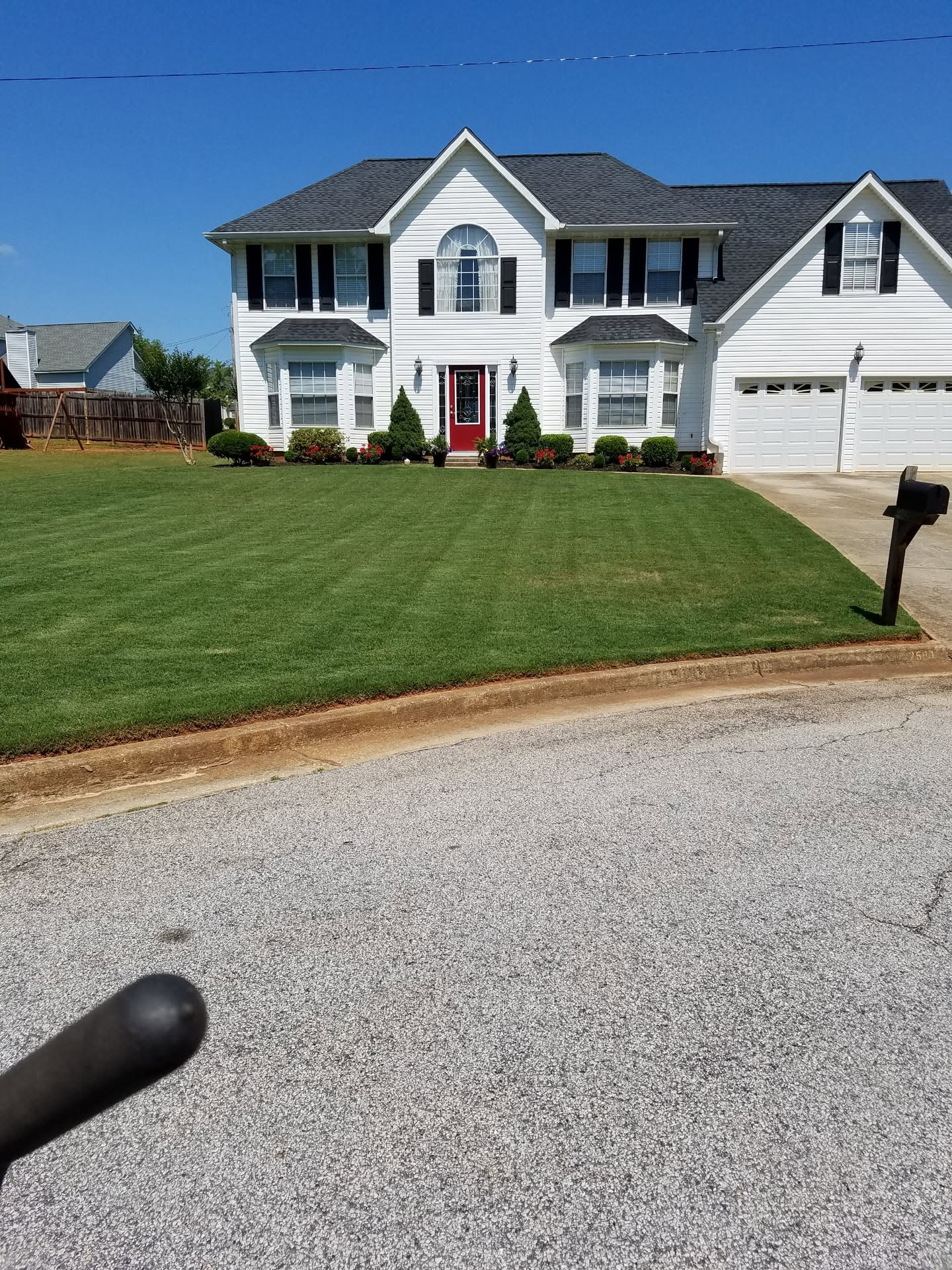 Neatly maintained front lawn and home